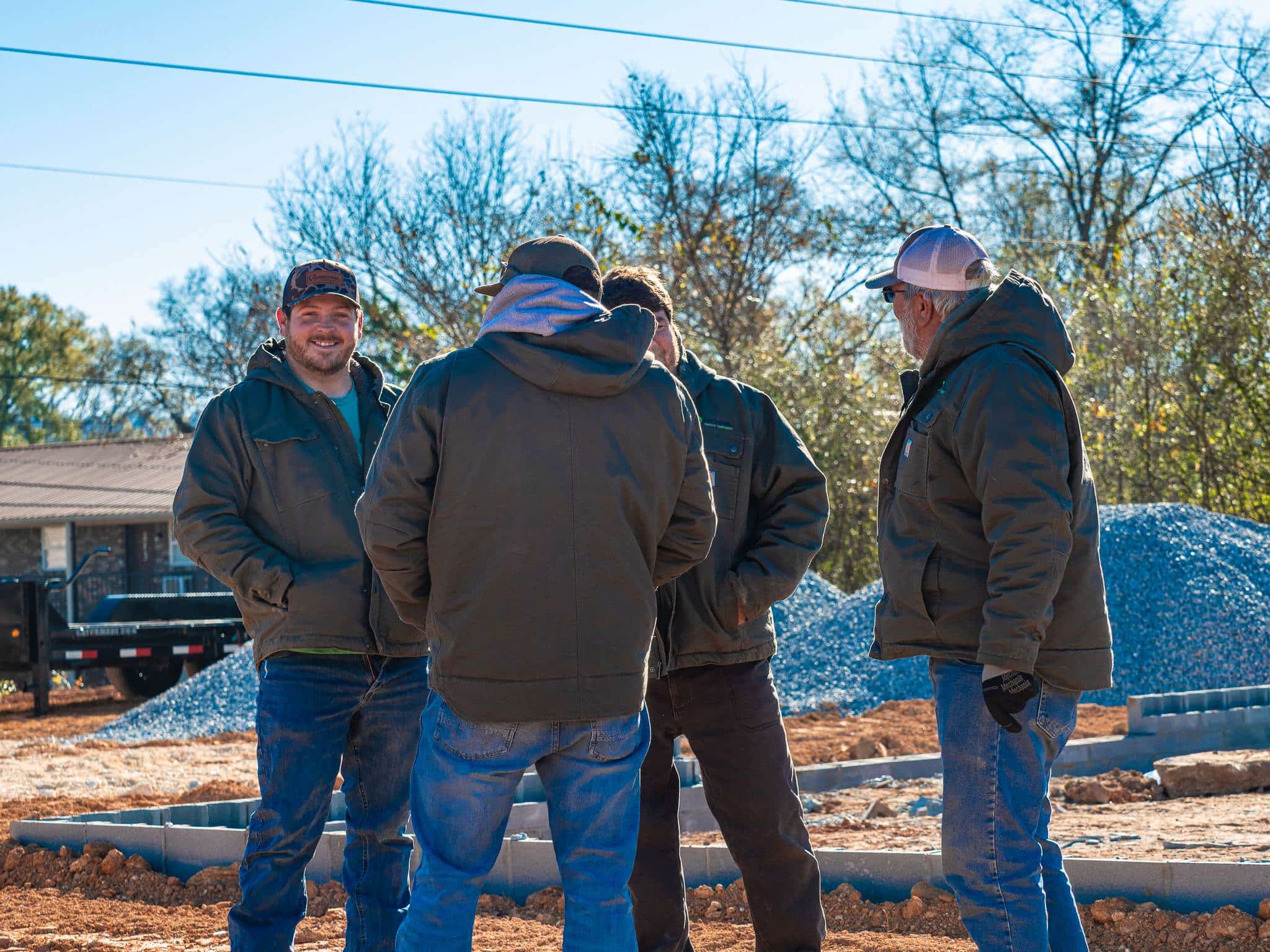 McMichael Waste Services crew coordinating on a commercial site-prep job in Alabama