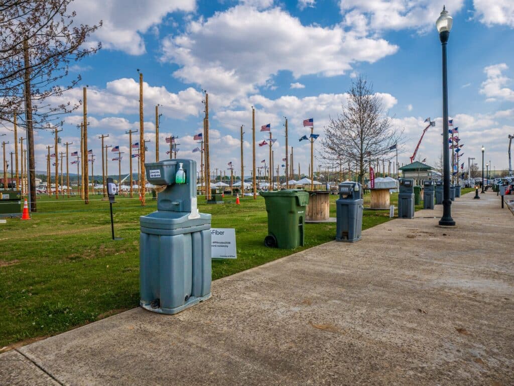 McMichael Waste Services hand-washing stations along an event walkway in Alabama