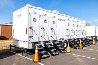 McMichael Waste Services shower trailer set up at an event in Alabama