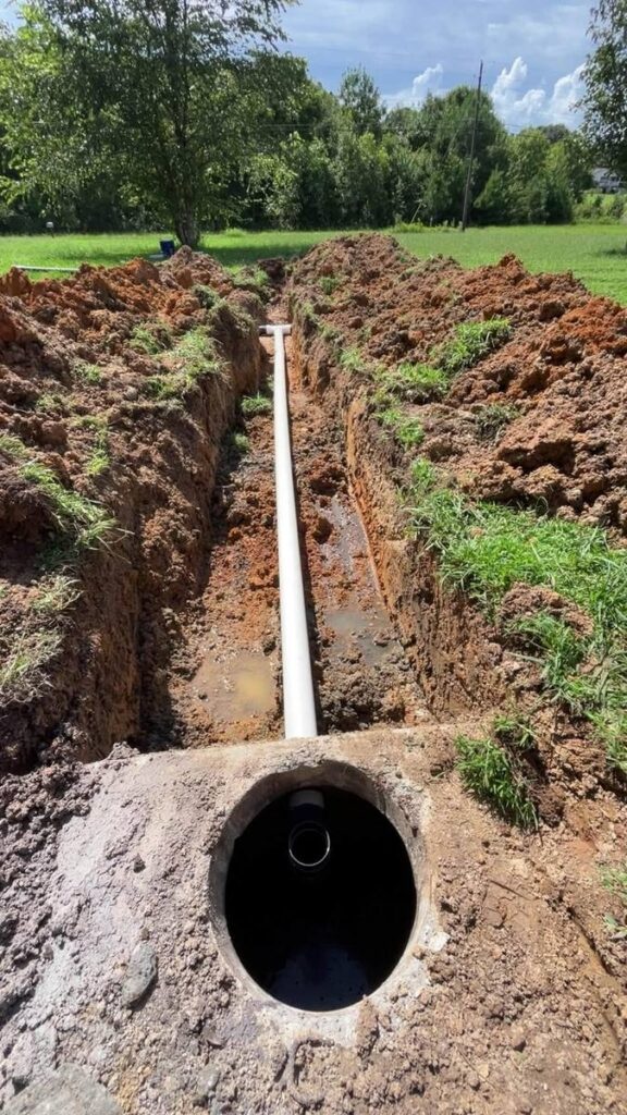 Sewer line run to a septic tank during installation in Alabama