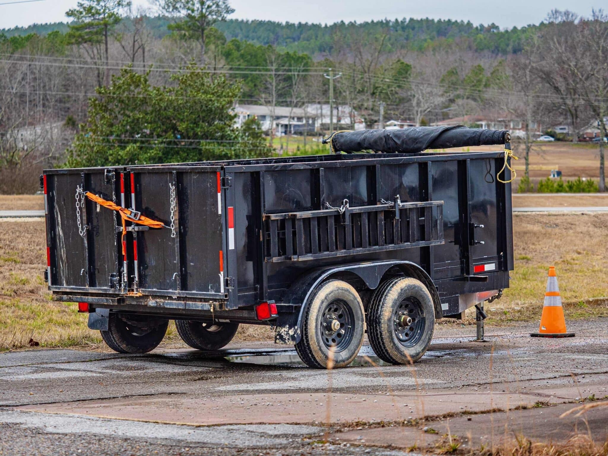 McMichael Waste Services tarped dump trailer on an Alabama jobsite