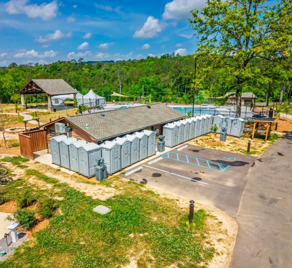 McMichael Waste Services portable toilets and hand-wash stations set up at an Alabama outdoor event