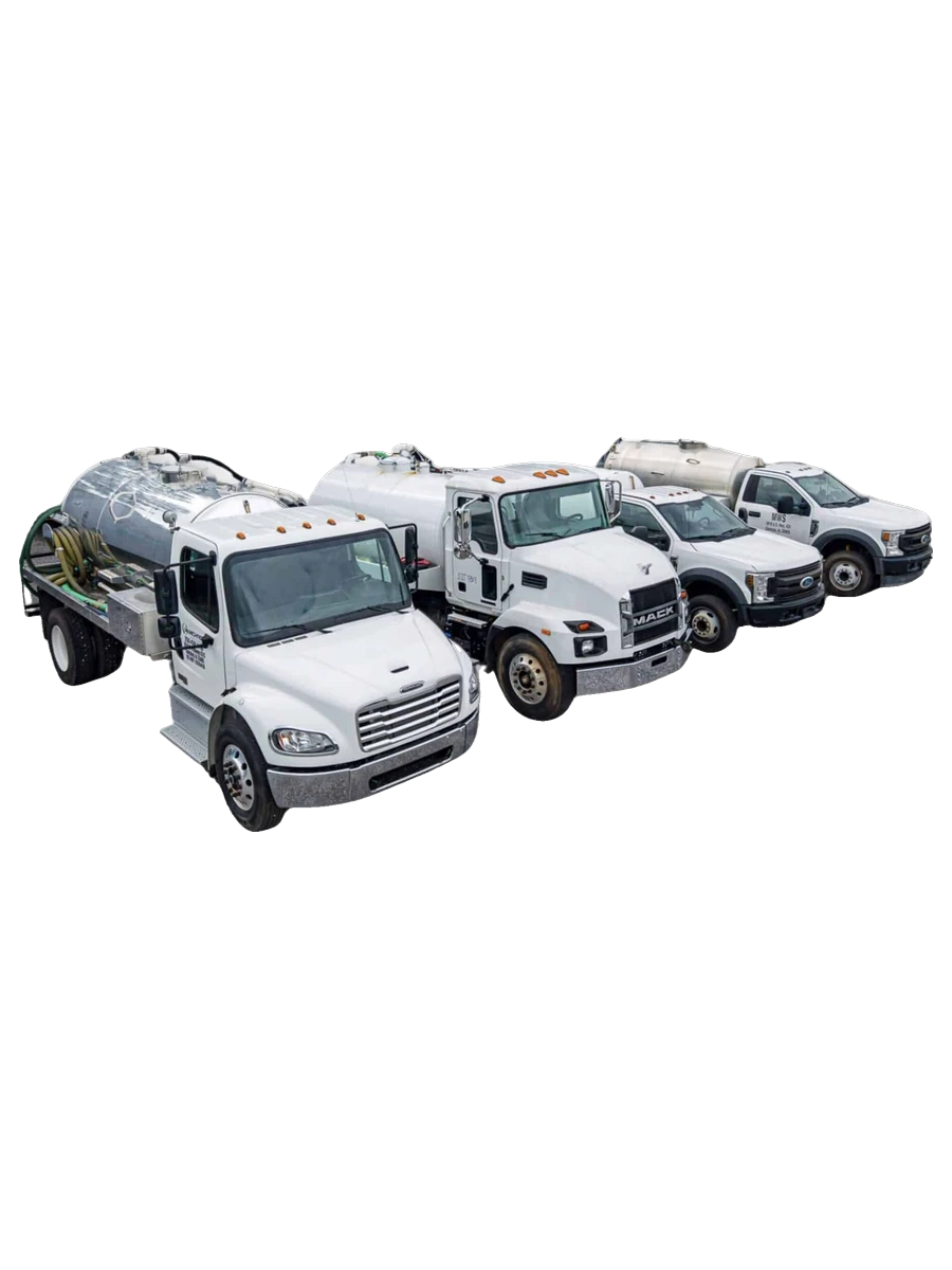 McMichael Waste Services septic fleet: a stainless vacuum tank truck, a Mack tank truck, and two Ford Super Duty service trucks