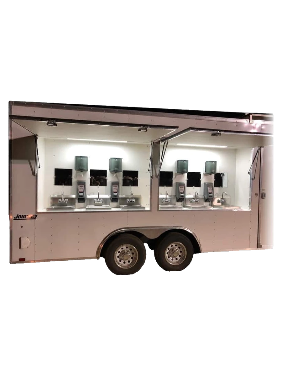 McMichael Waste Services multi-station hand-wash trailer with eight stainless sinks, soap and towel dispensers