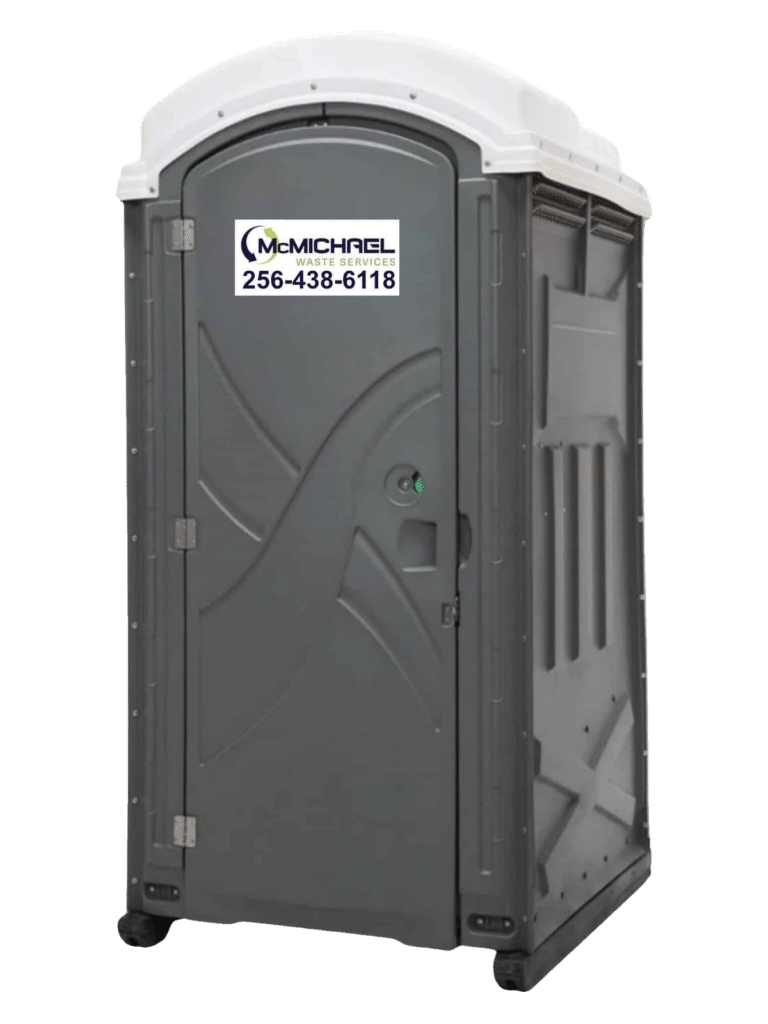 Standard McMichael Waste Services portable toilet with the company decal and 256-438-6118 on the door